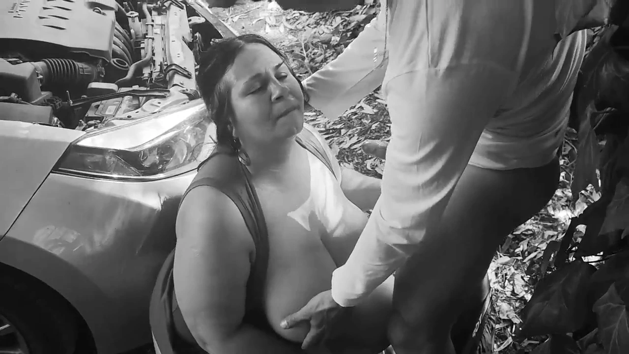 Voluptuous stepmom seduces young man in car parking lot porn video
